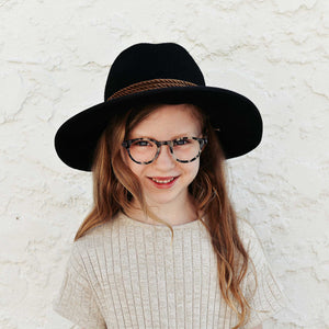 augie-eyewear-childrens-glasses-poppy-black-_-white-tortoise-on-girl1.jpg