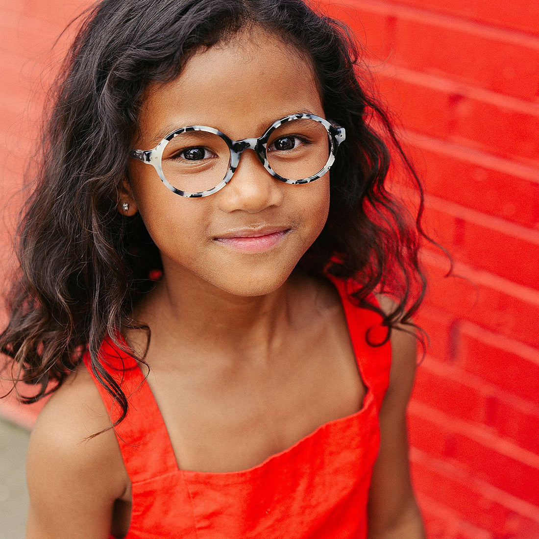 augie-eyewear-frankie-black-and-white-tortoise-on-girl.jpg
